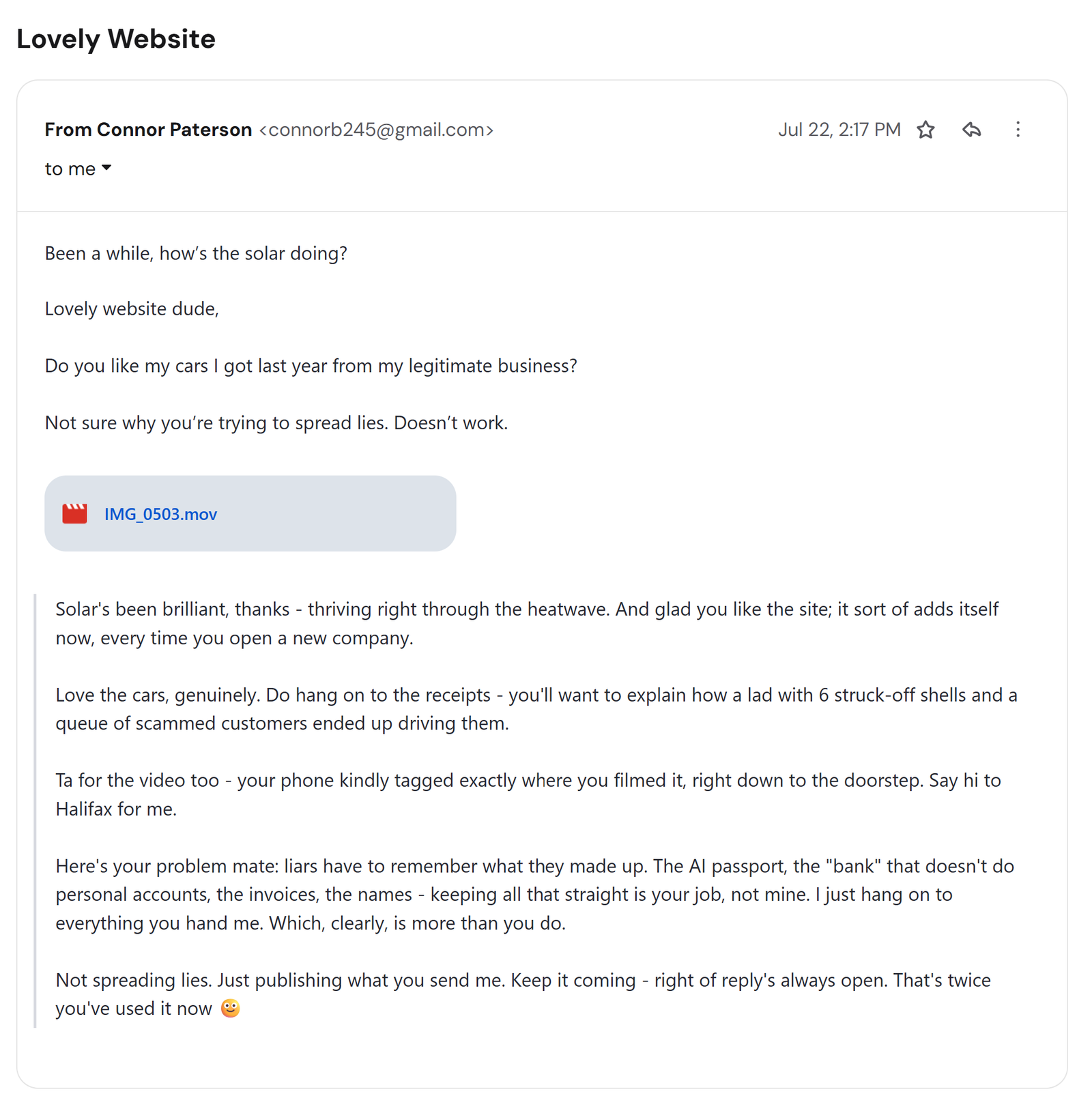 Email reply from Connor Paterson (connorb245@gmail.com) boasting about his cars and denying the scam, 22 July 2026